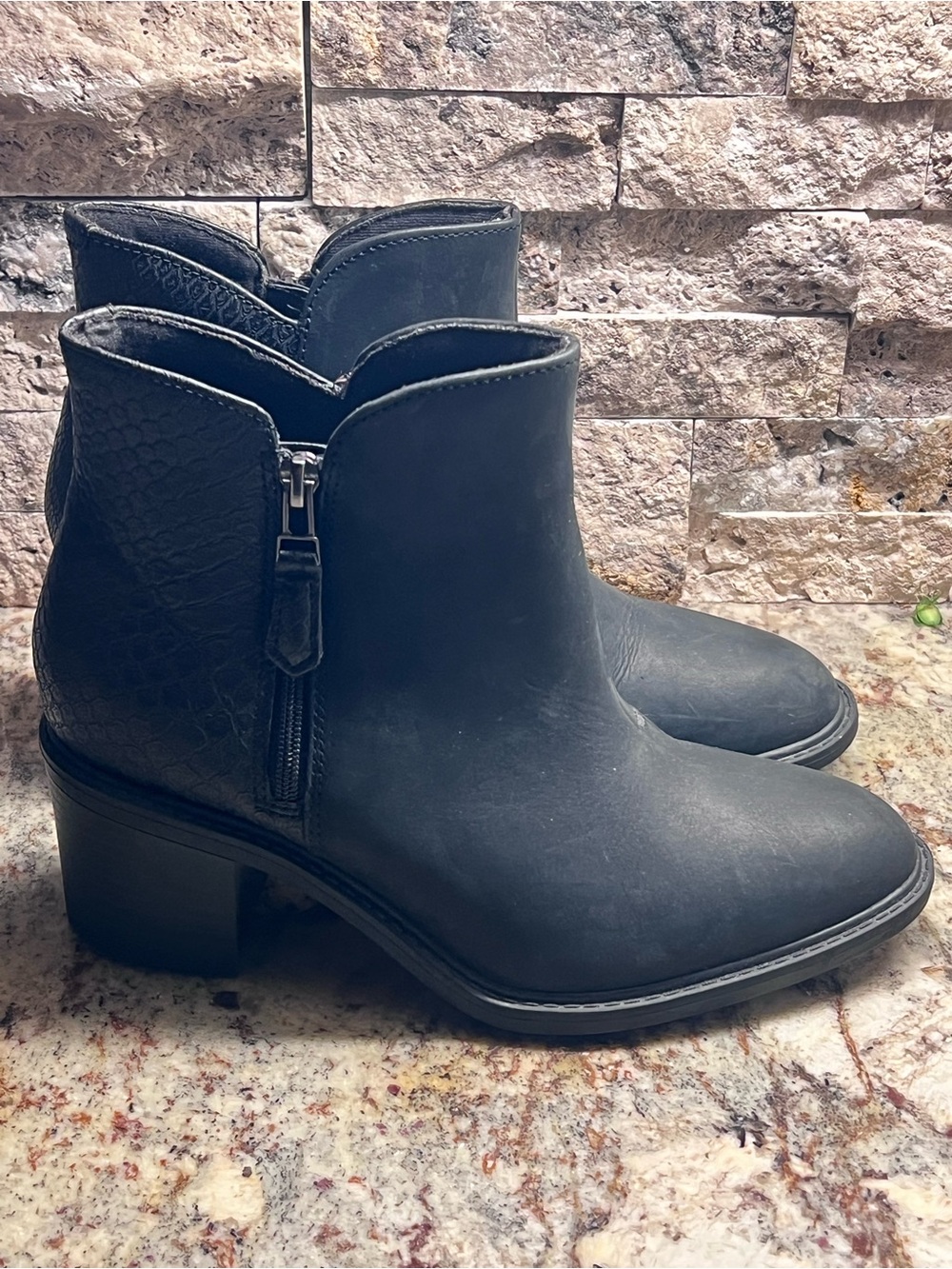 Ladies size 7.5- CLARKS black leather ankle booties featuring a side zipper